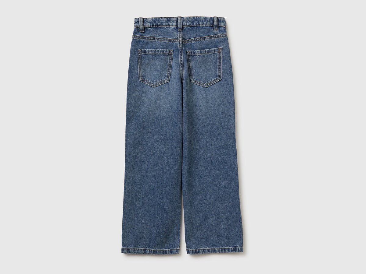 Jeans straight con occhielli