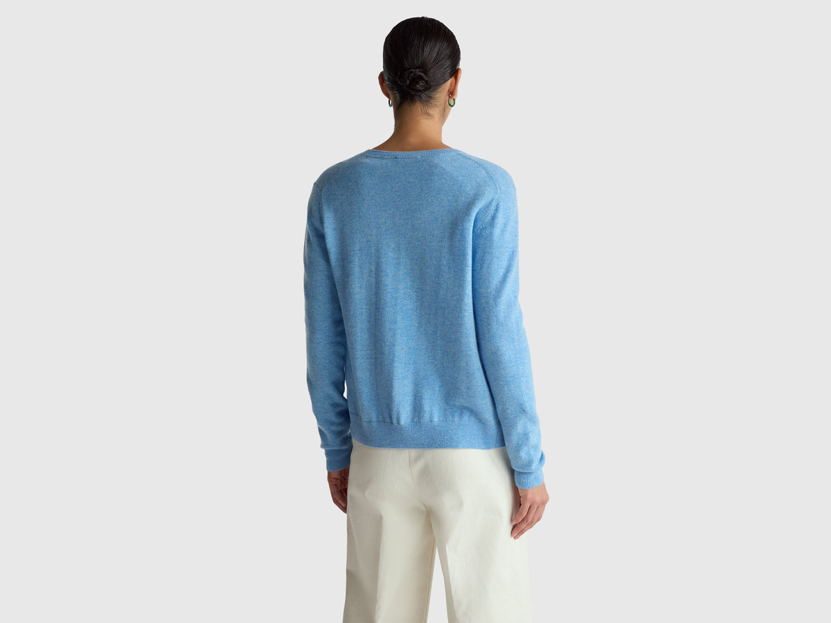 Cardigan girocollo azzurro in pura lana Merino