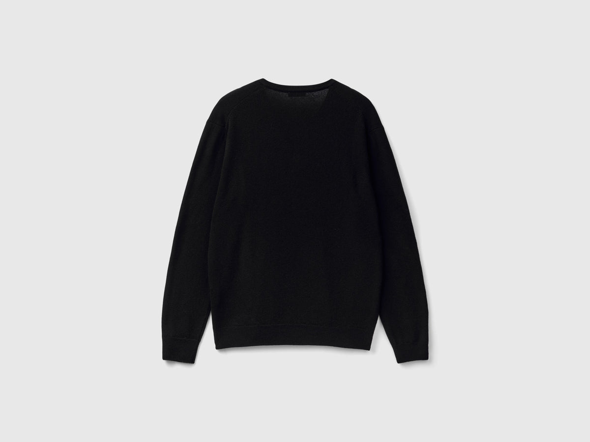 Maglia scollo a V nera in pura lana Merino
