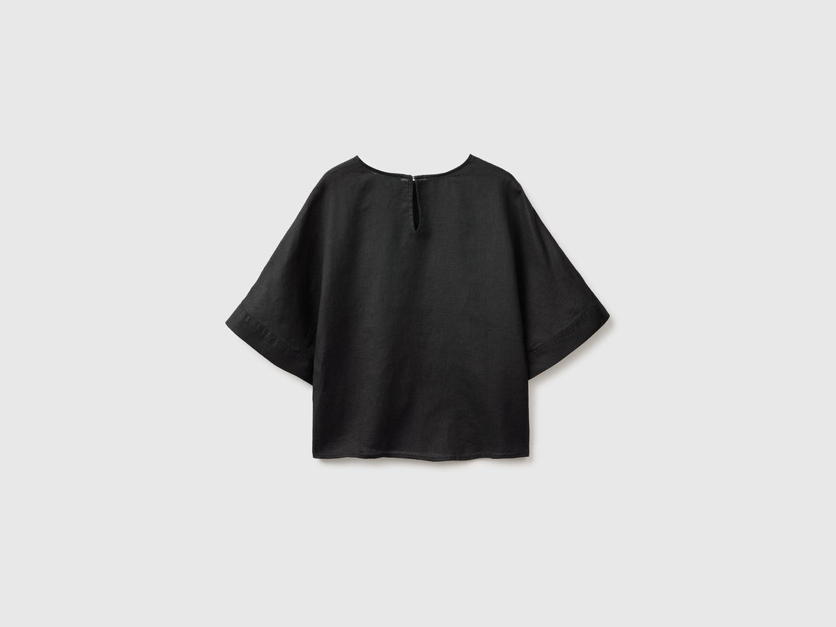 Blusa girocollo in puro lino