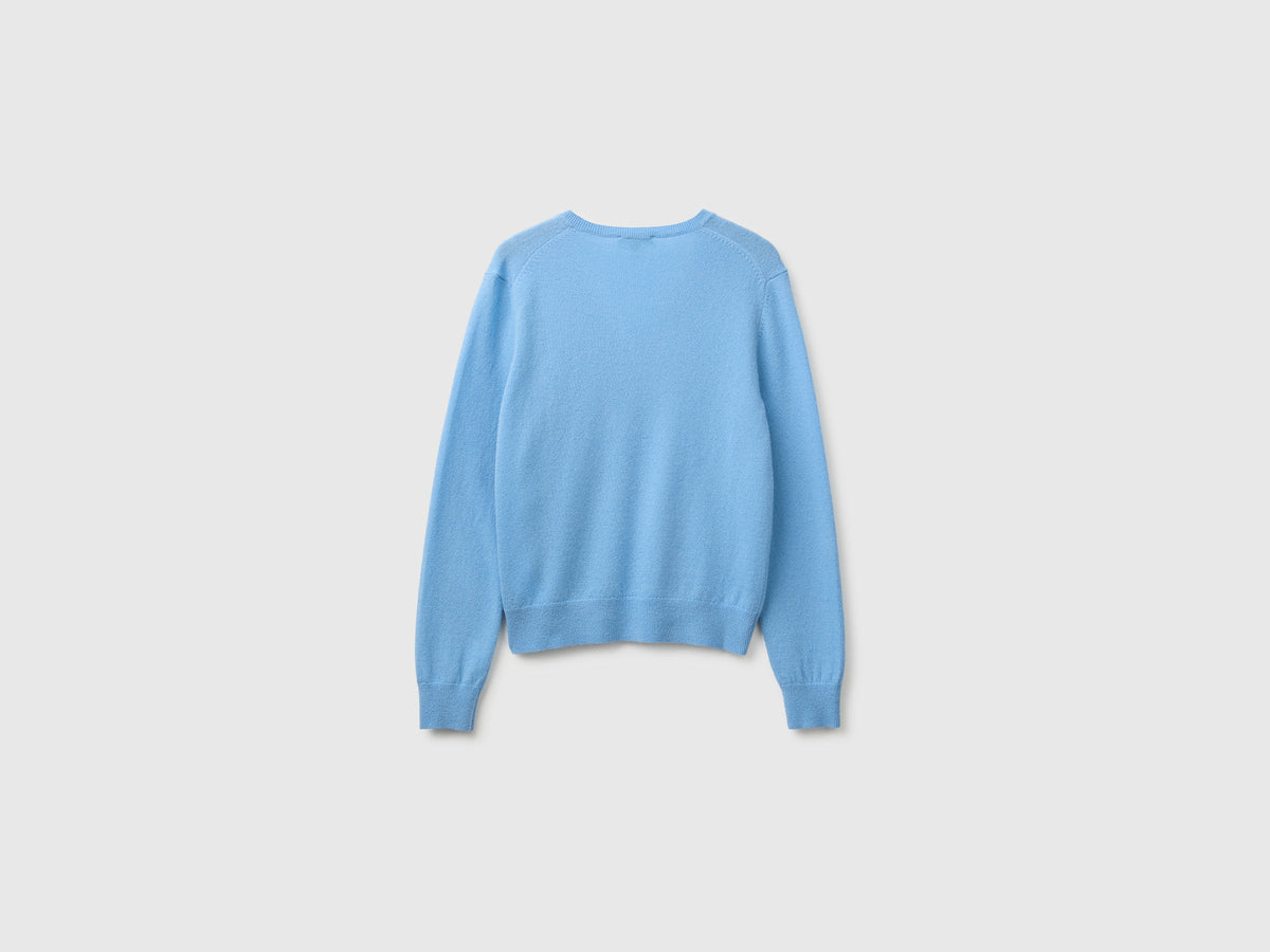 Maglia scollo a V azzurra in pura lana Merino