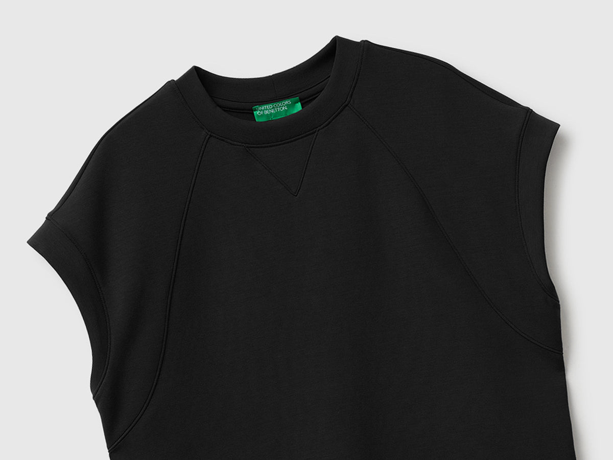 Top fluido con spacchi