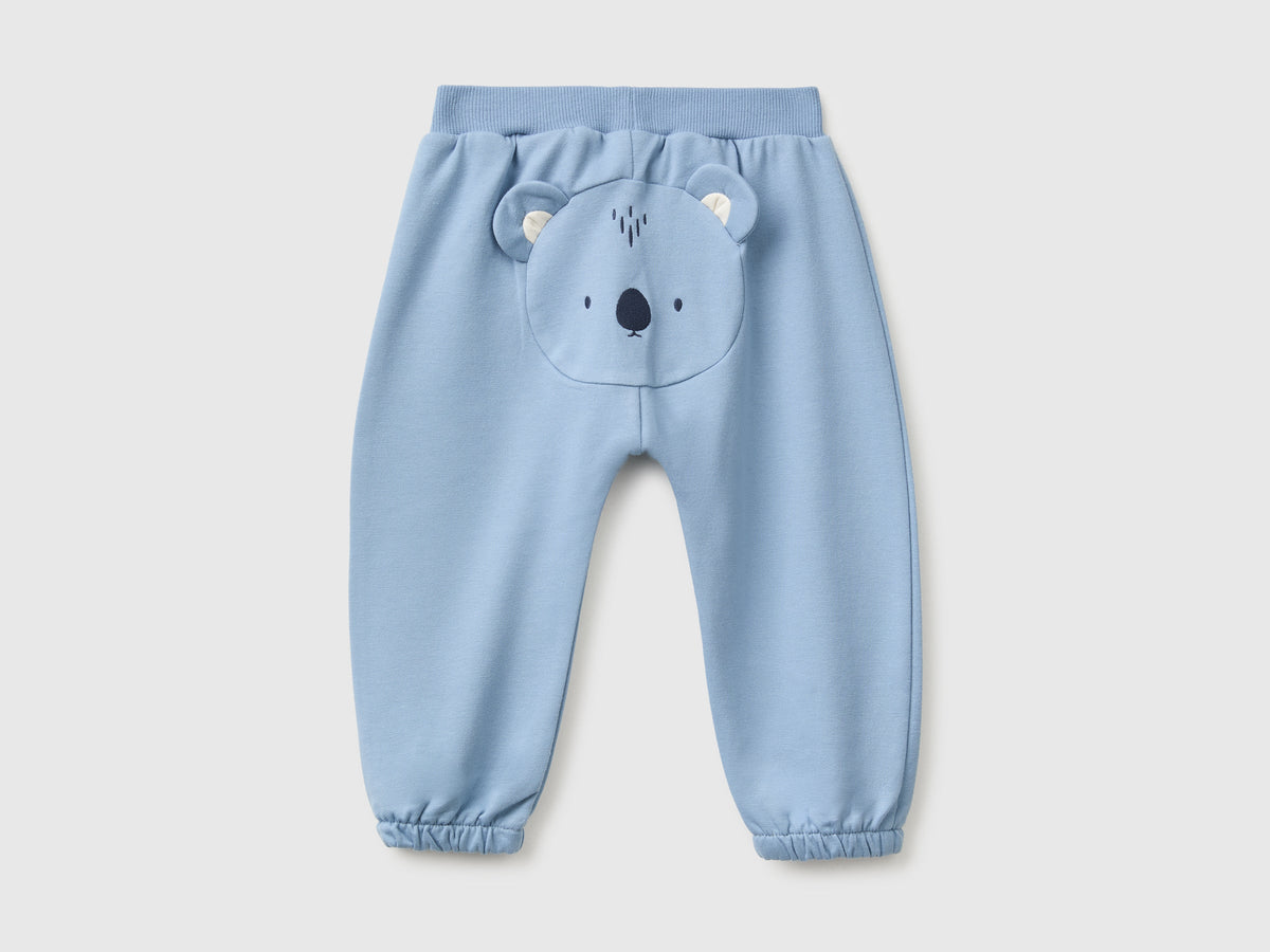 Pantaloni in felpa con animaletto sul retro