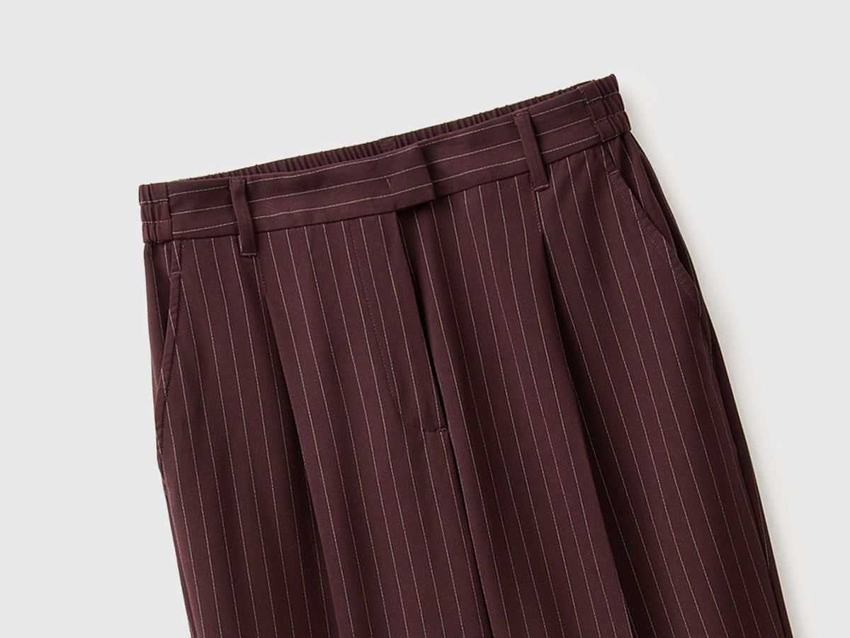 Pantaloni gessati carrot fit
