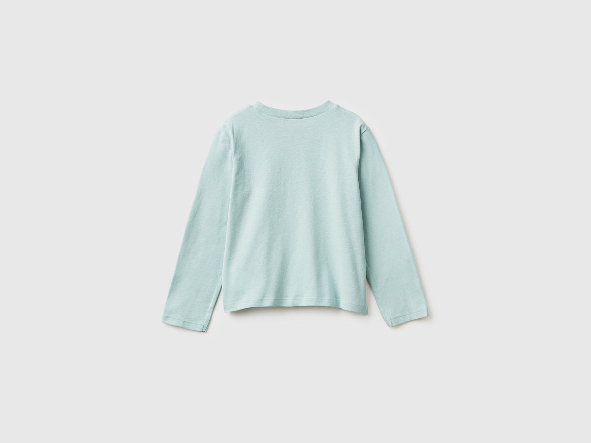 T-shirt con stampa glitter