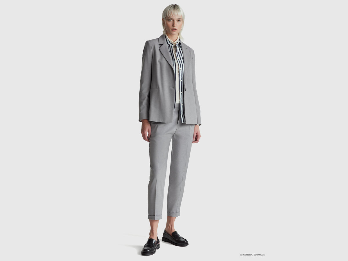 Pantaloni con risvolto in misto viscosa stretch