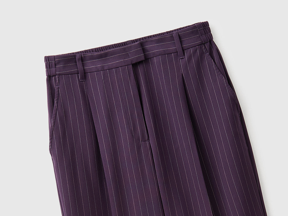 Pantaloni gessati carrot fit