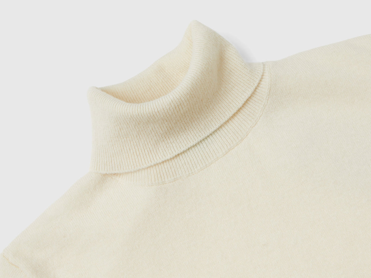 Maglione dolcevita panna in pura lana Merino