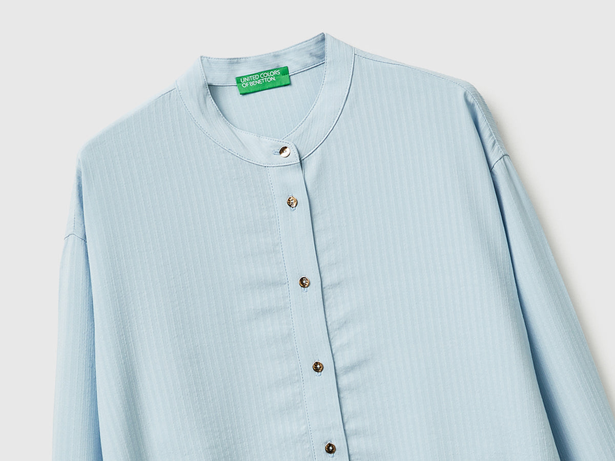 Blusa a righe con collo alla coreana