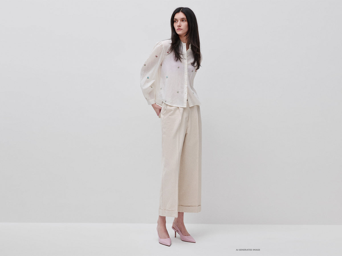 Pantaloni ampi con risvolto