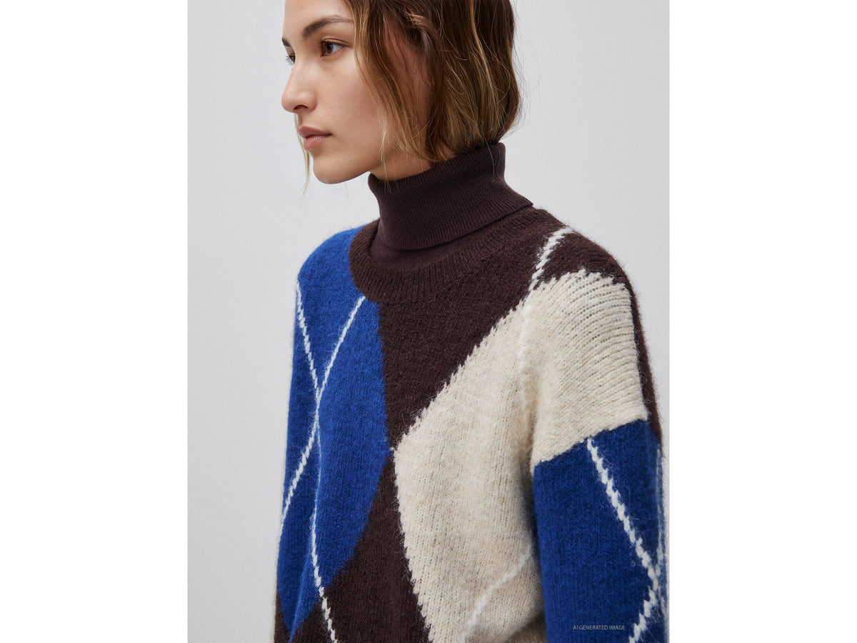 Maglia over con rombi in misto lana