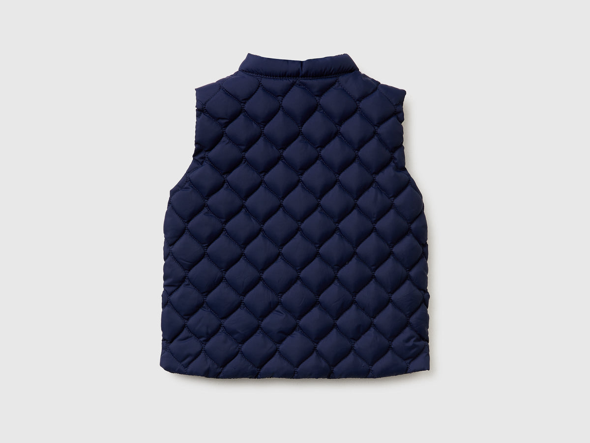 Piumino smanicato con zip