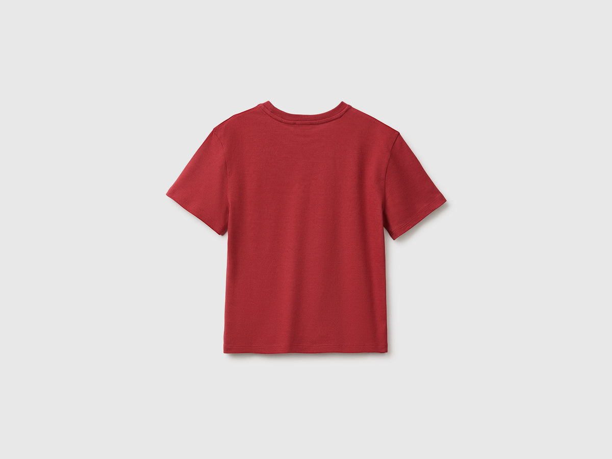T-shirt con stampa glitter