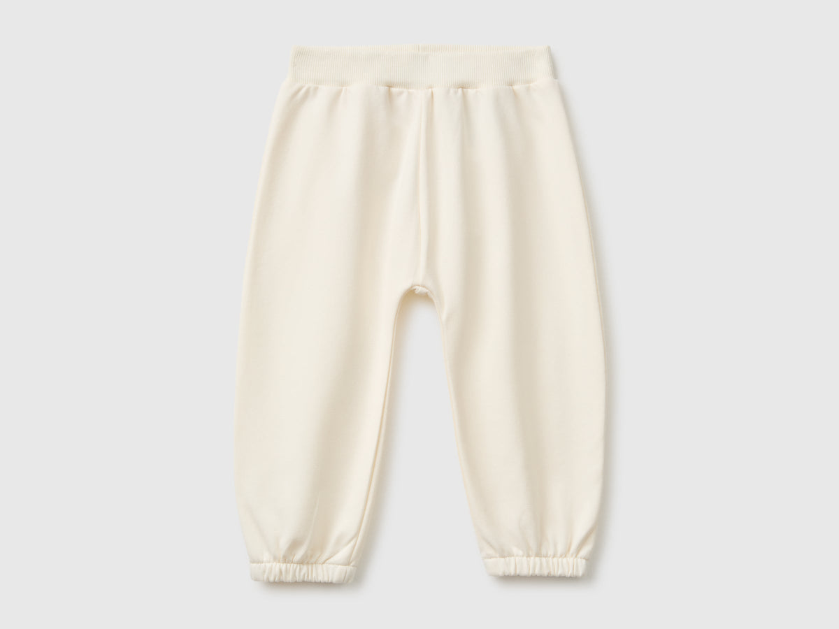 Pantaloni in felpa con animaletto sul retro