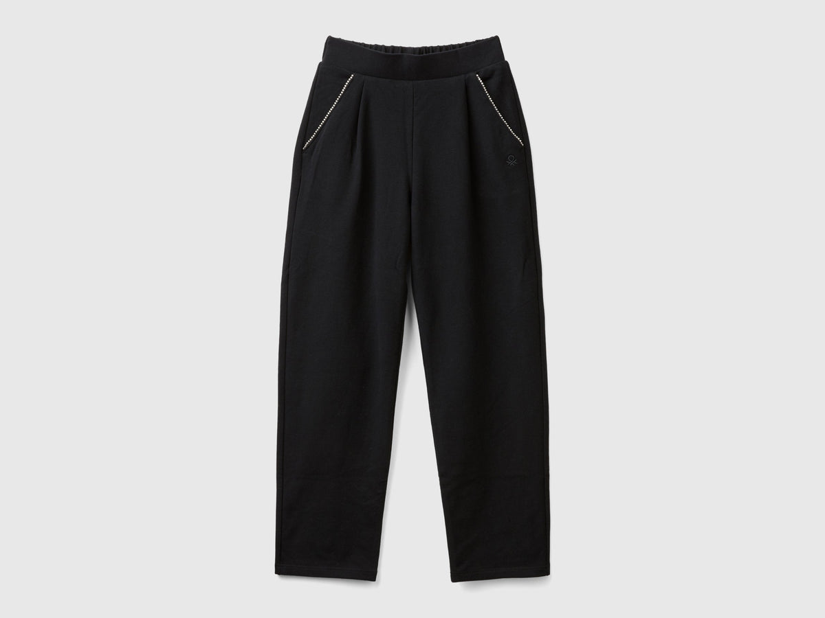 Pantaloni con applicazione effetto gioiello