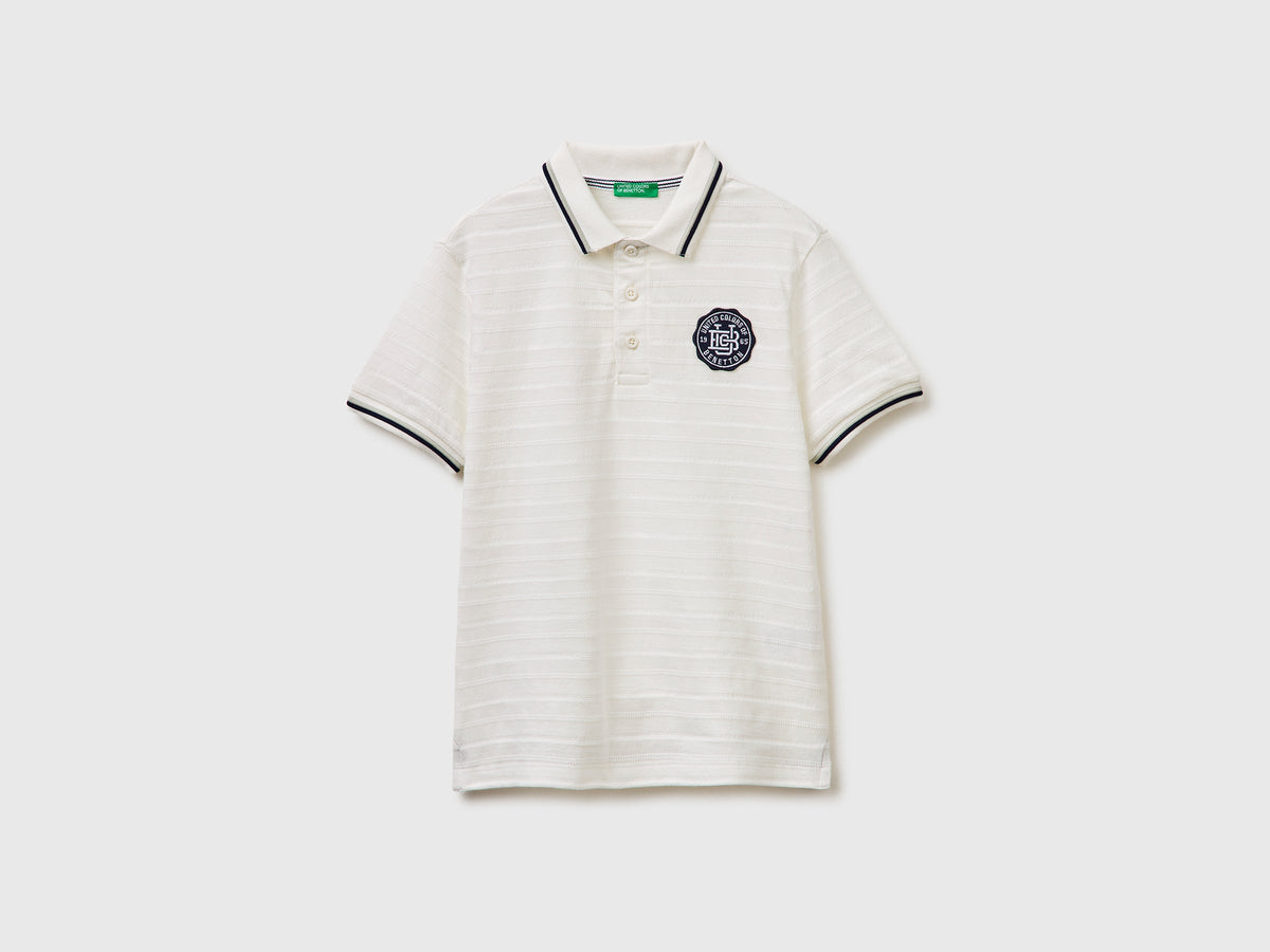 Polo a righe con patch
