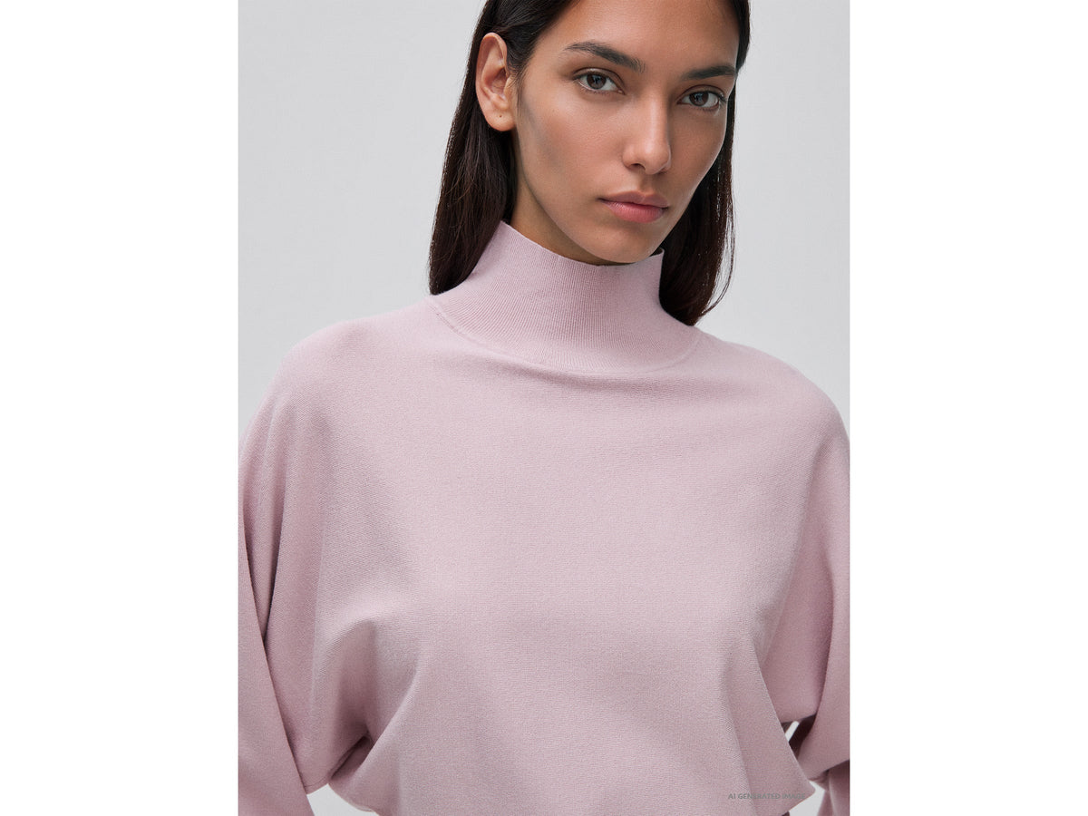 Maglia collo alto con manica a pipistrello