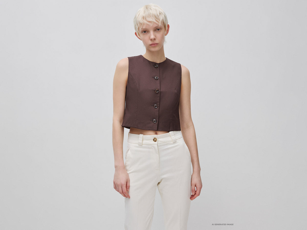 Gilet girocollo con bottoni