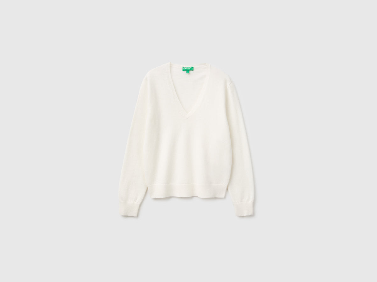 Maglia scollo a V panna in pura lana Merino