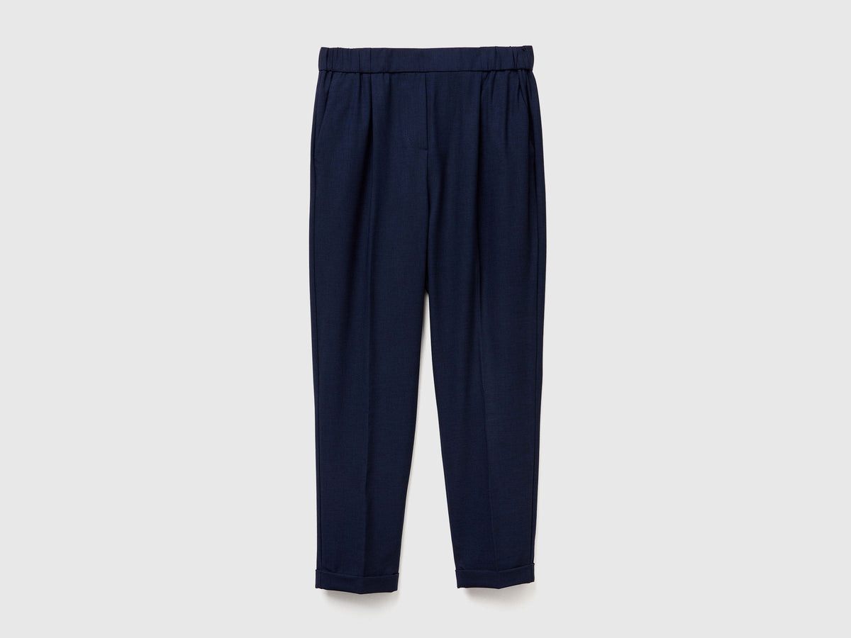 Pantaloni con risvolto in misto viscosa stretch