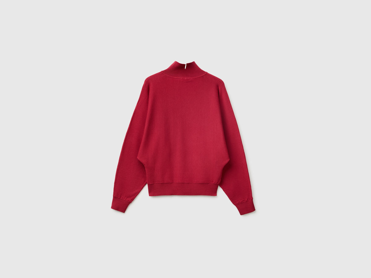 Maglia collo alto con manica a pipistrello