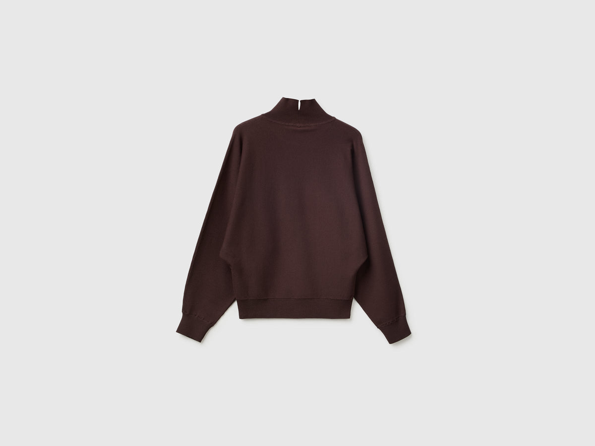 Maglia collo alto con manica a pipistrello