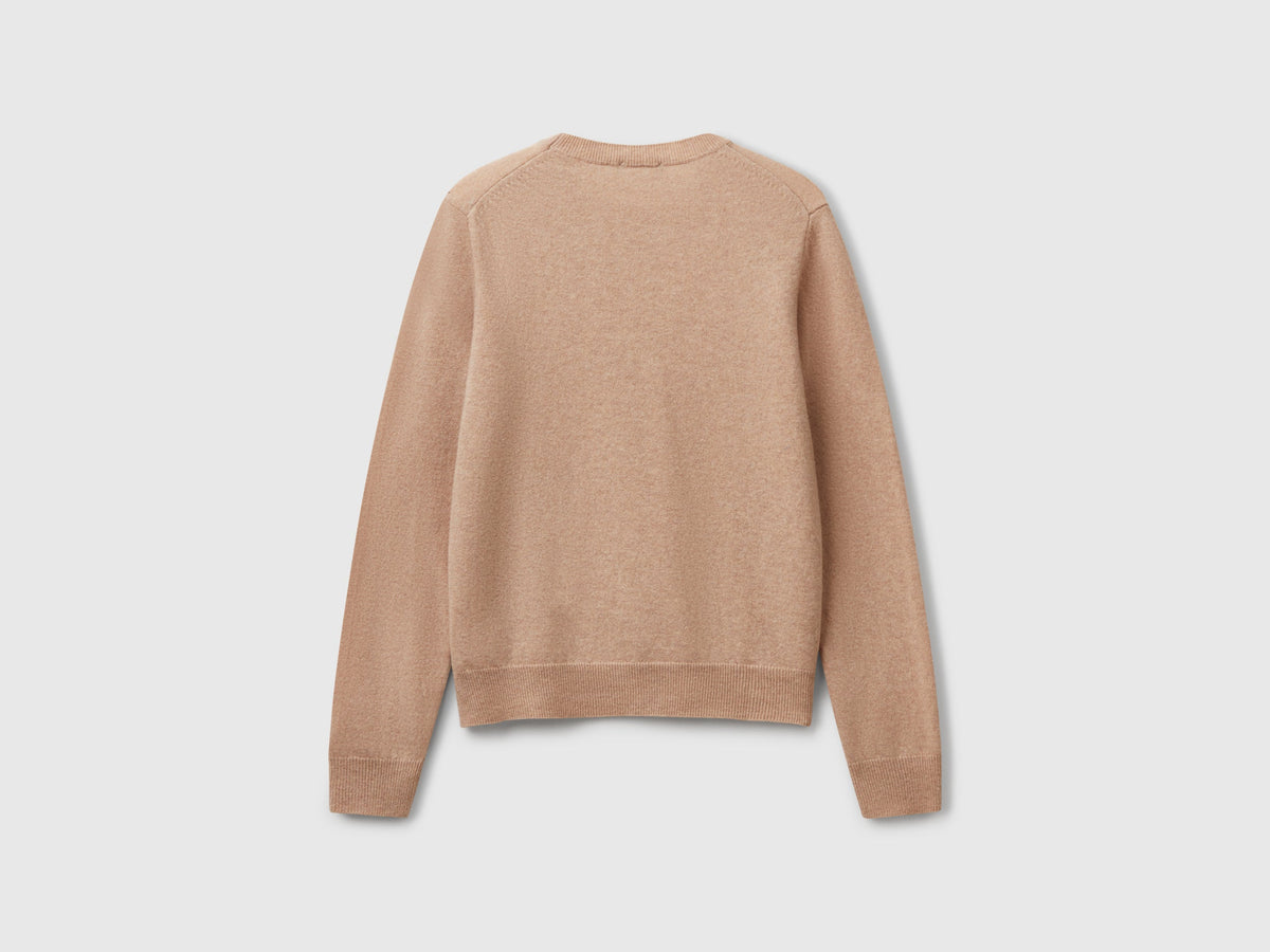 Maglia girocollo beige in pura lana Merino