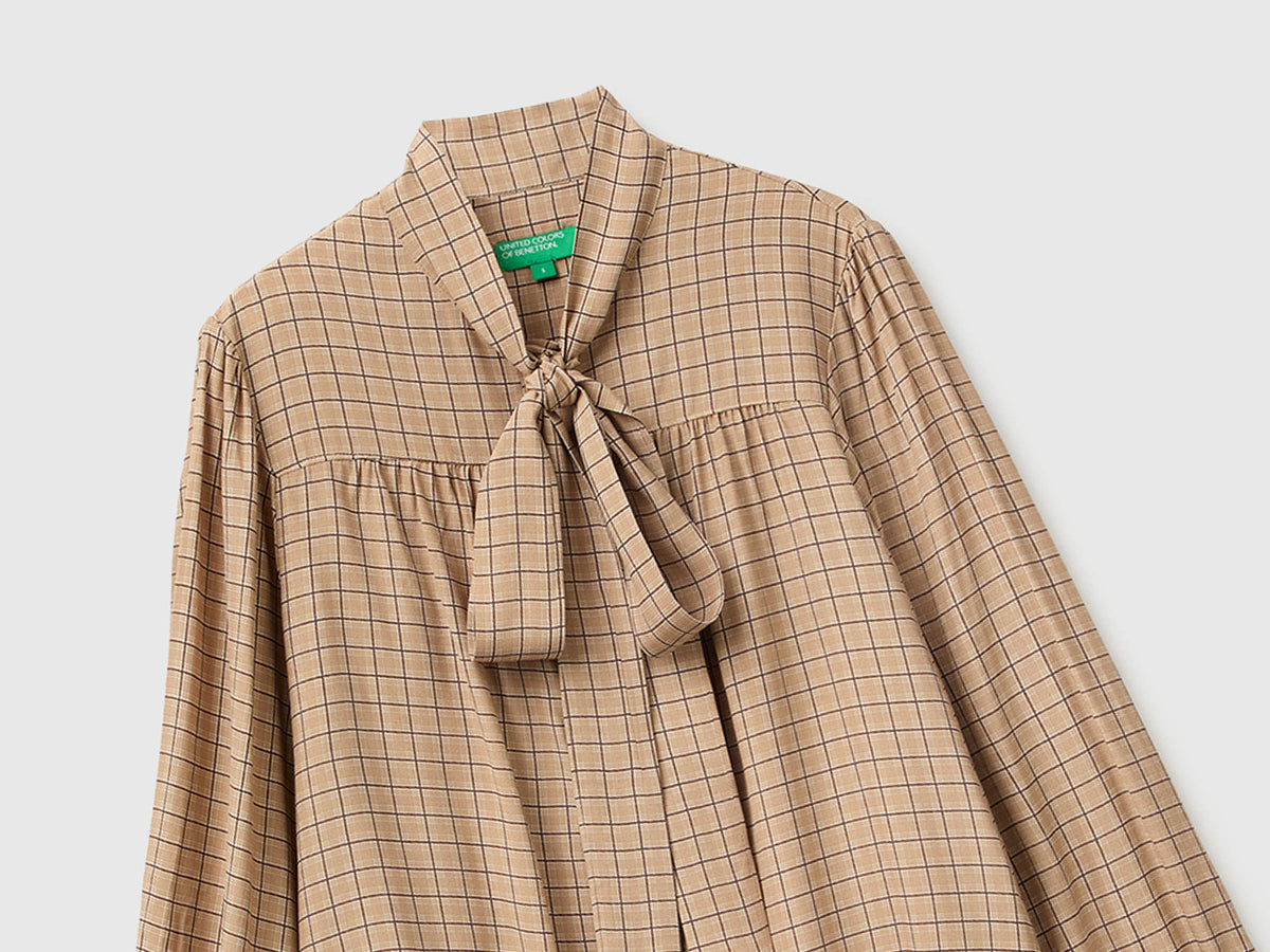 Blusa a quadretti vichy con fiocco