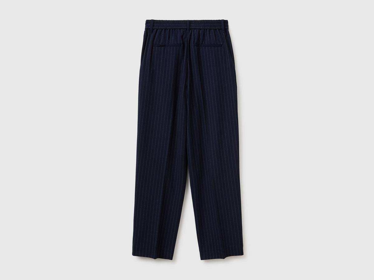 Pantaloni gessati carrot fit