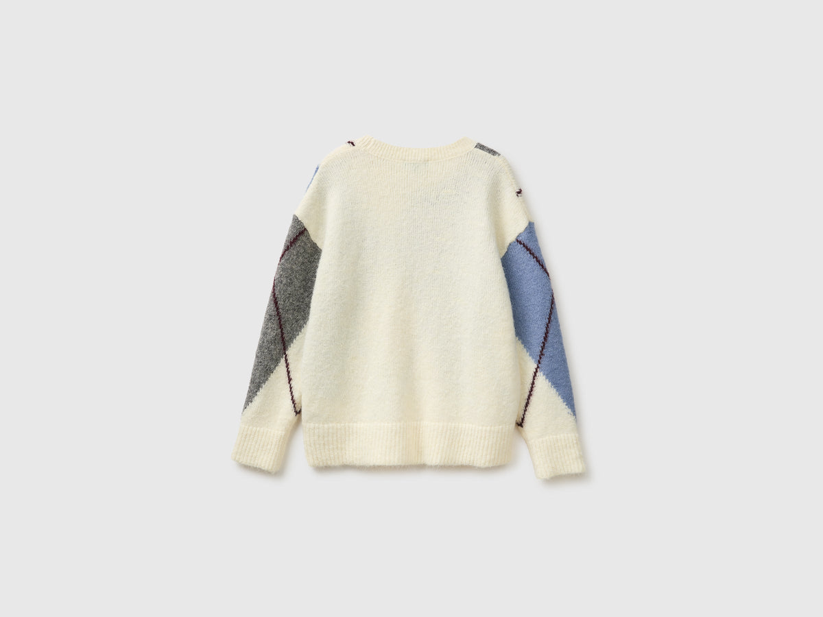 Maglia over con rombi in misto lana