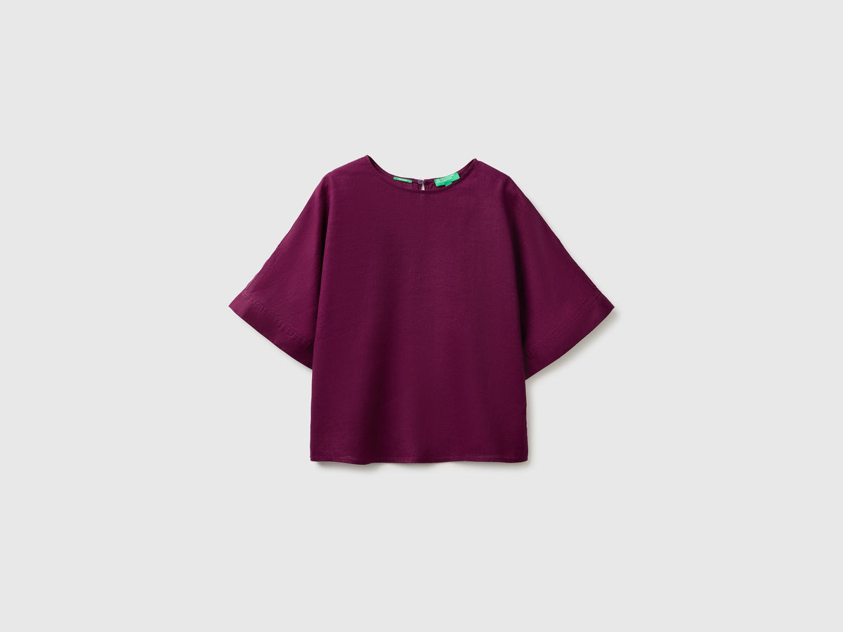 Blusa girocollo in puro lino