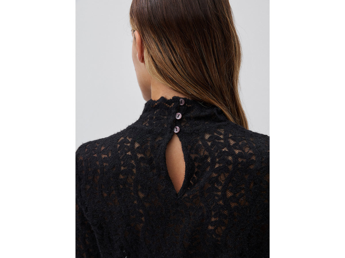 Blusa collo alto in pizzo