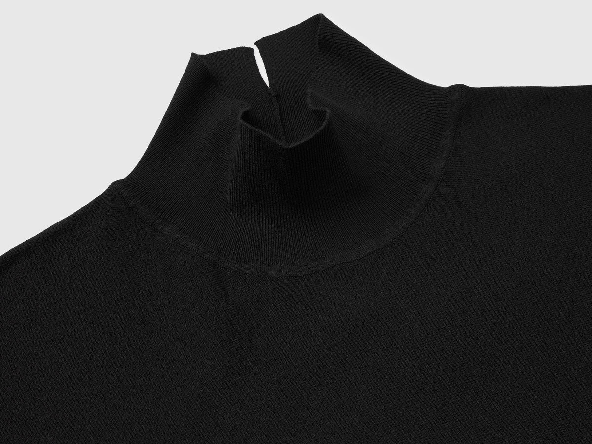 Maglia collo alto con manica a pipistrello