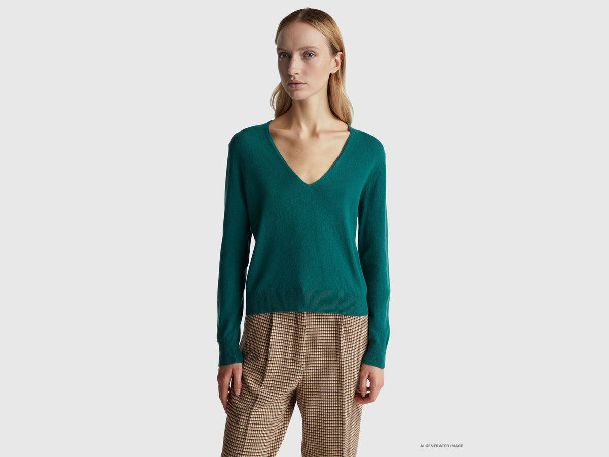 Maglione verde con scollo a V in pura lana Merino