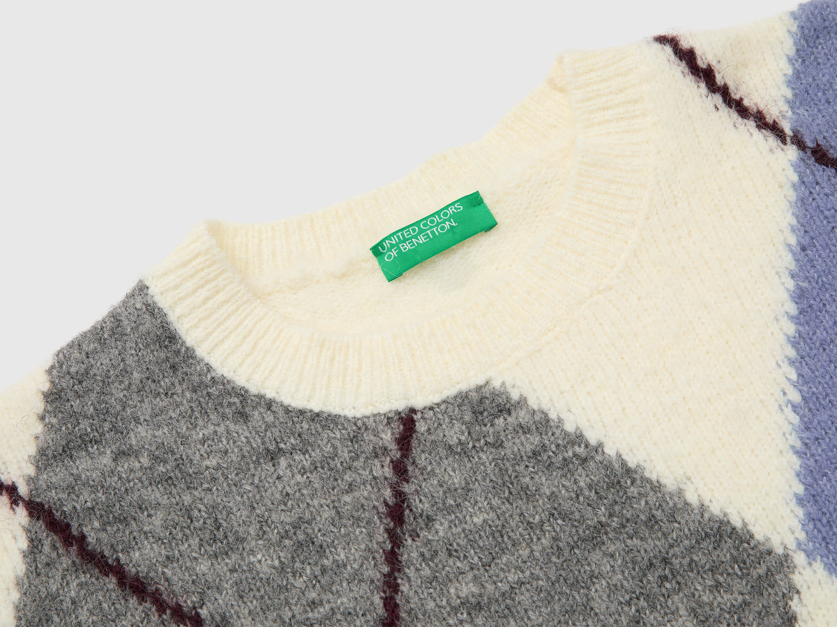 Maglia over con rombi in misto lana