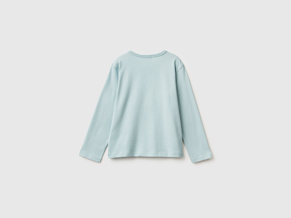 T-shirt con stampa e paillettes