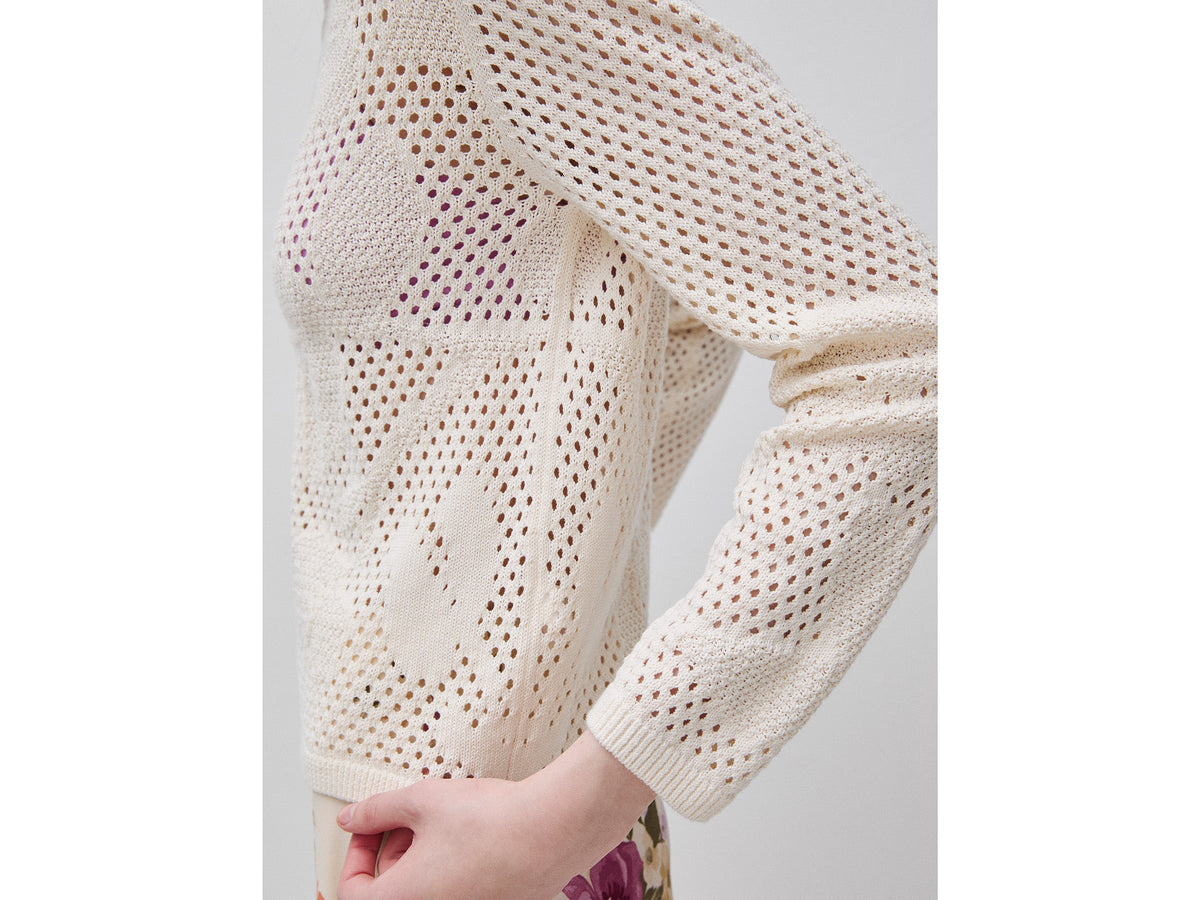 Maglia traforata con fiori