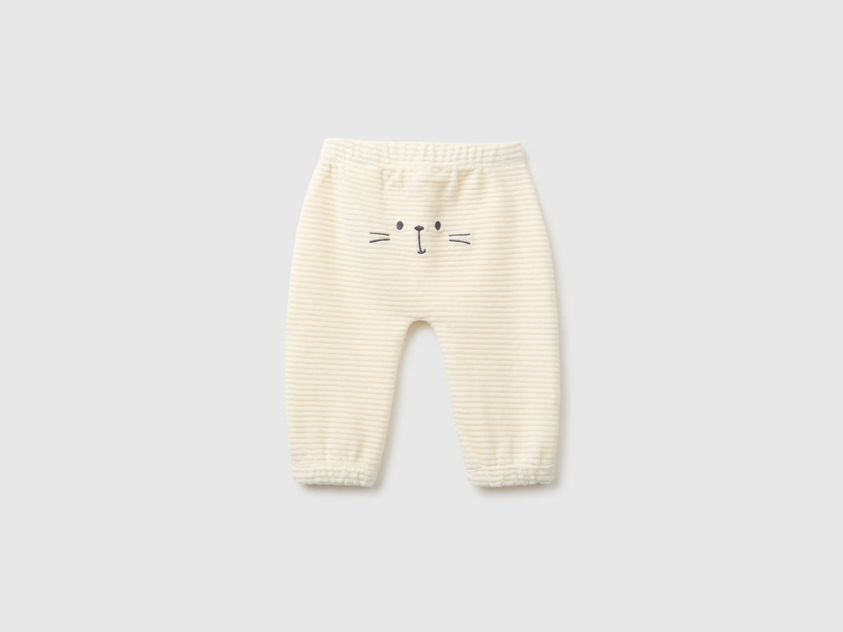 Pantaloni in ciniglia con ricamo dietro