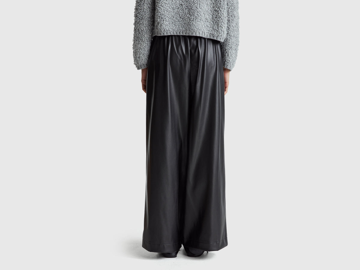 Pantaloni in tessuto spalmato