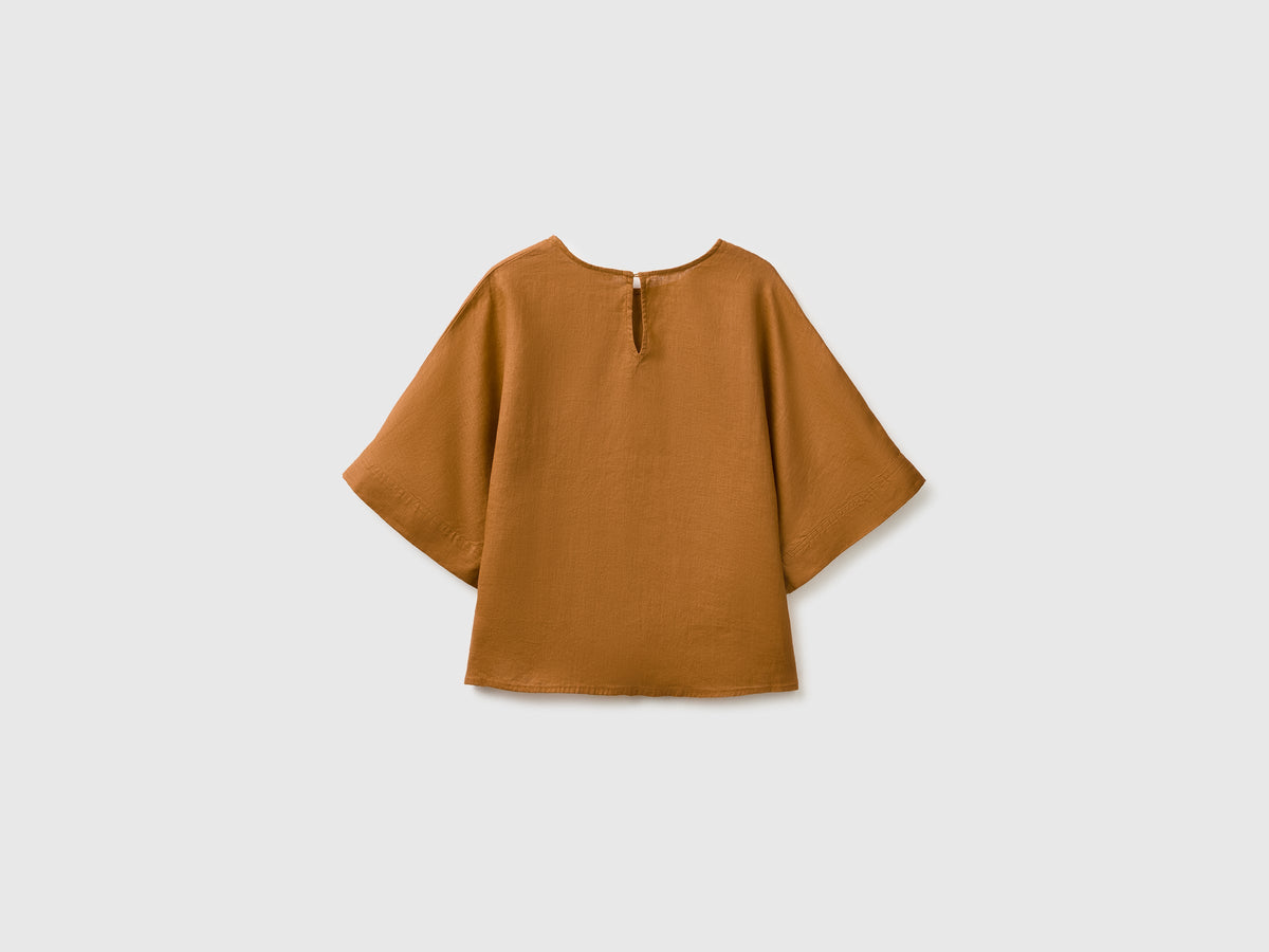 Blusa girocollo in puro lino