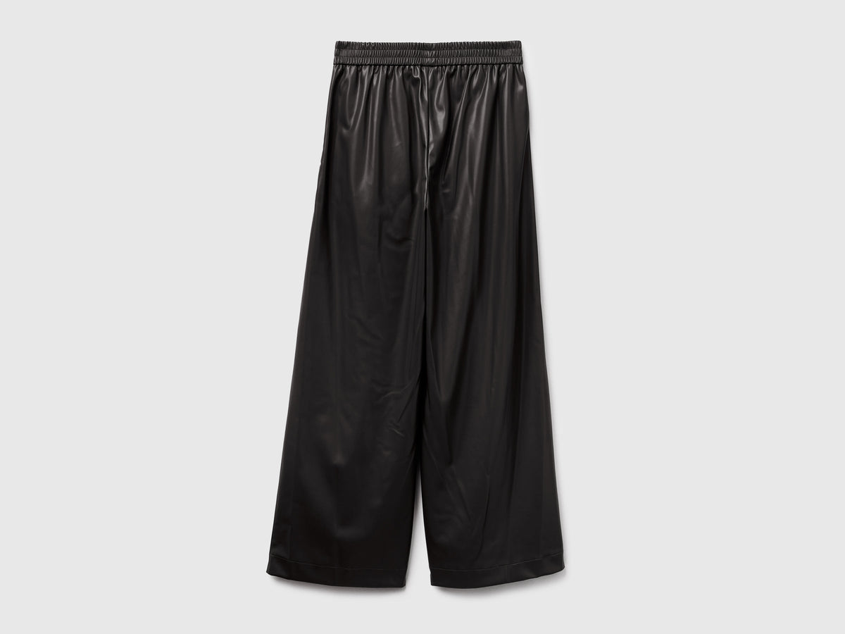 Pantaloni in tessuto spalmato