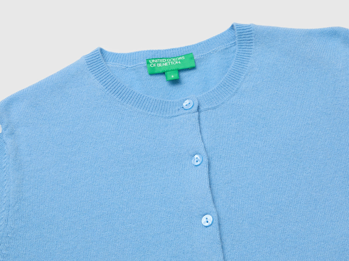 Cardigan girocollo azzurro in pura lana Merino