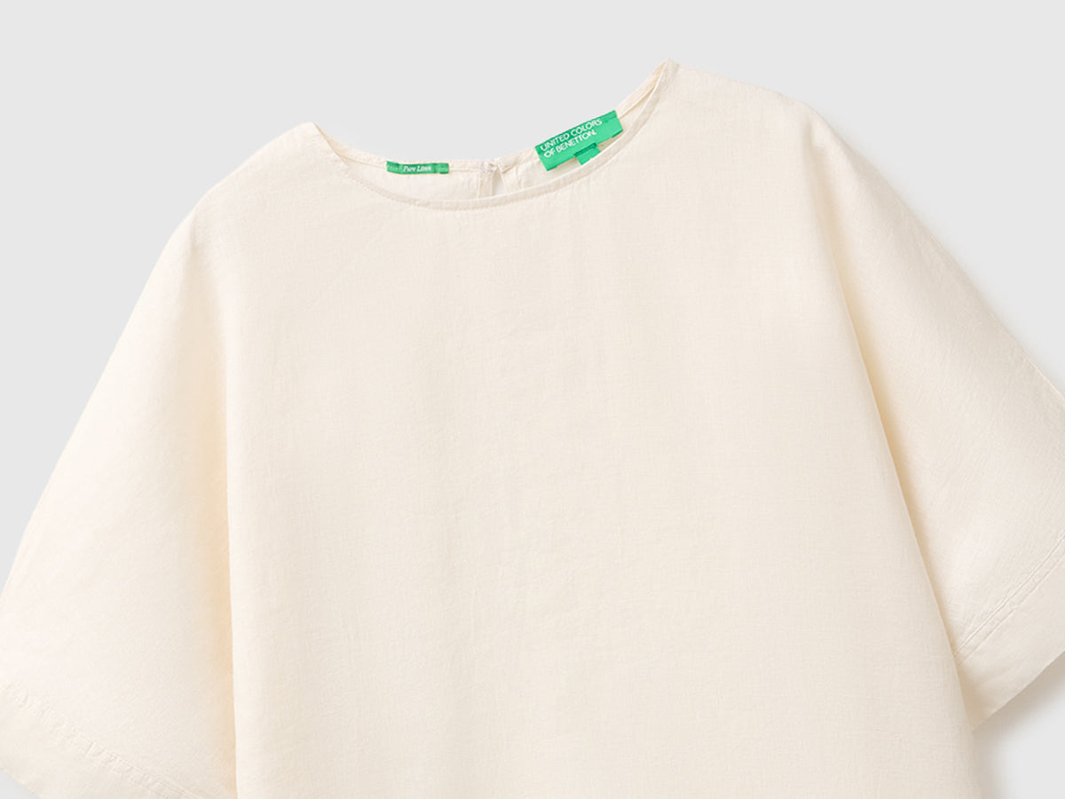 Blusa girocollo in puro lino