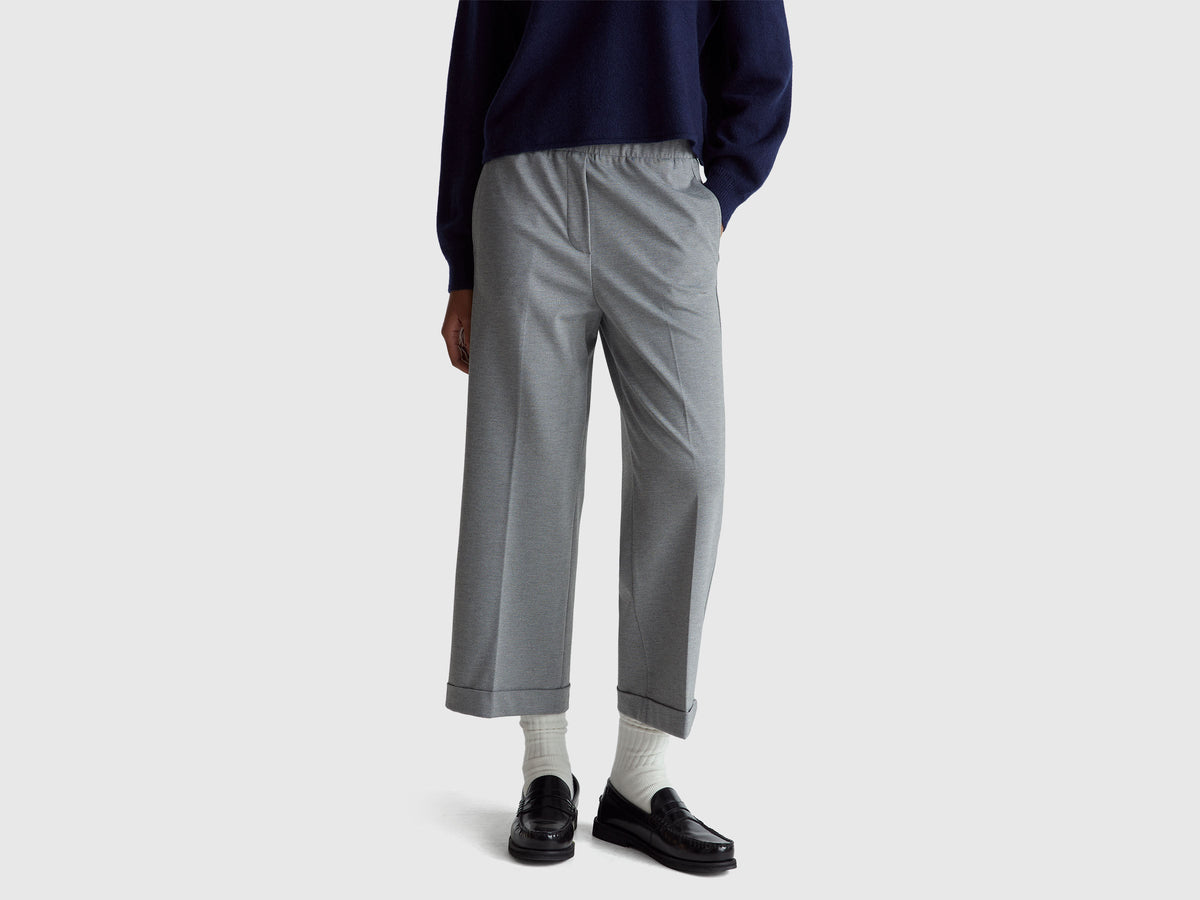 Pantaloni con elastico in vita e risvolto