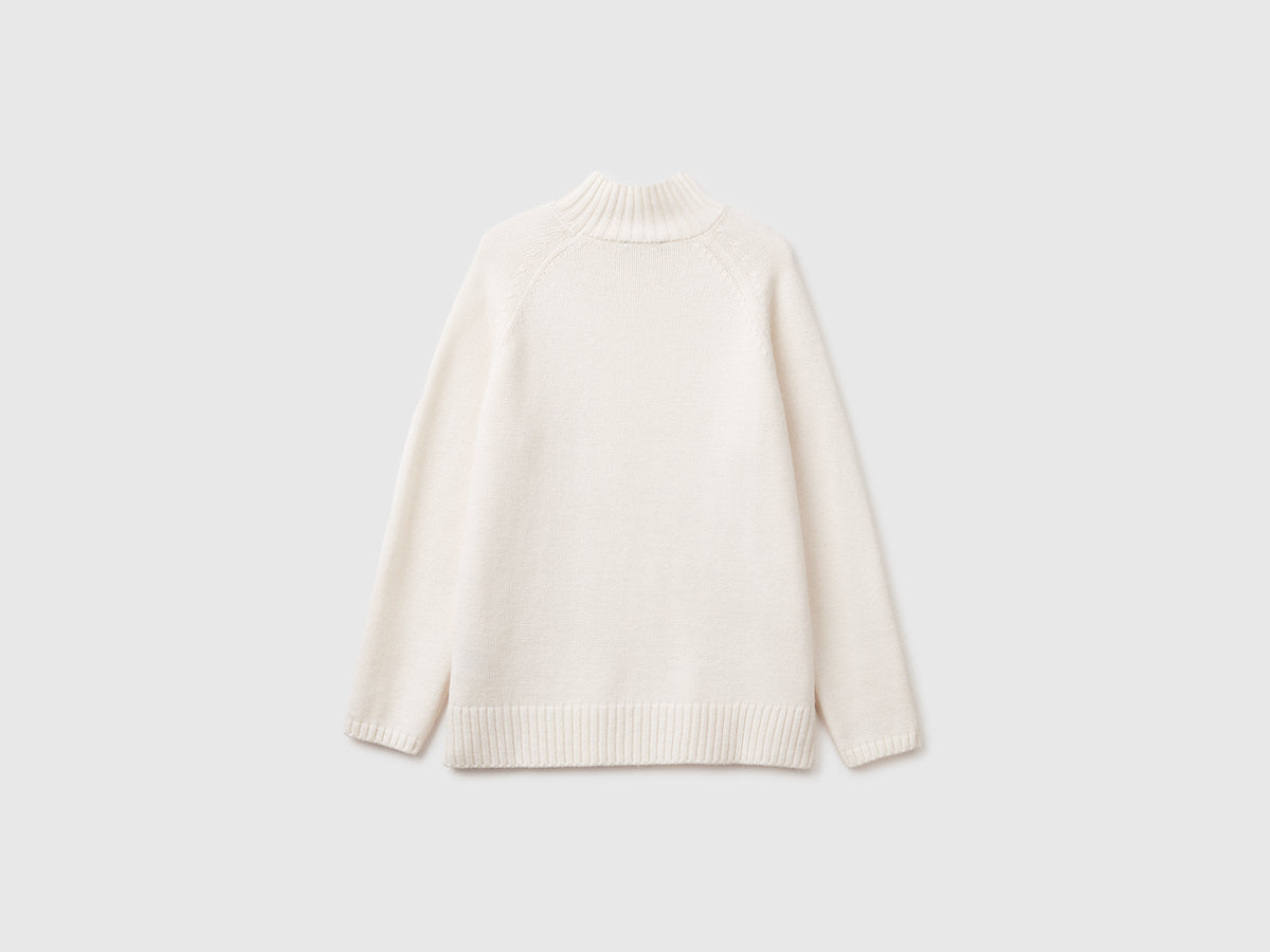 Maglione dolcevita over fit con frange