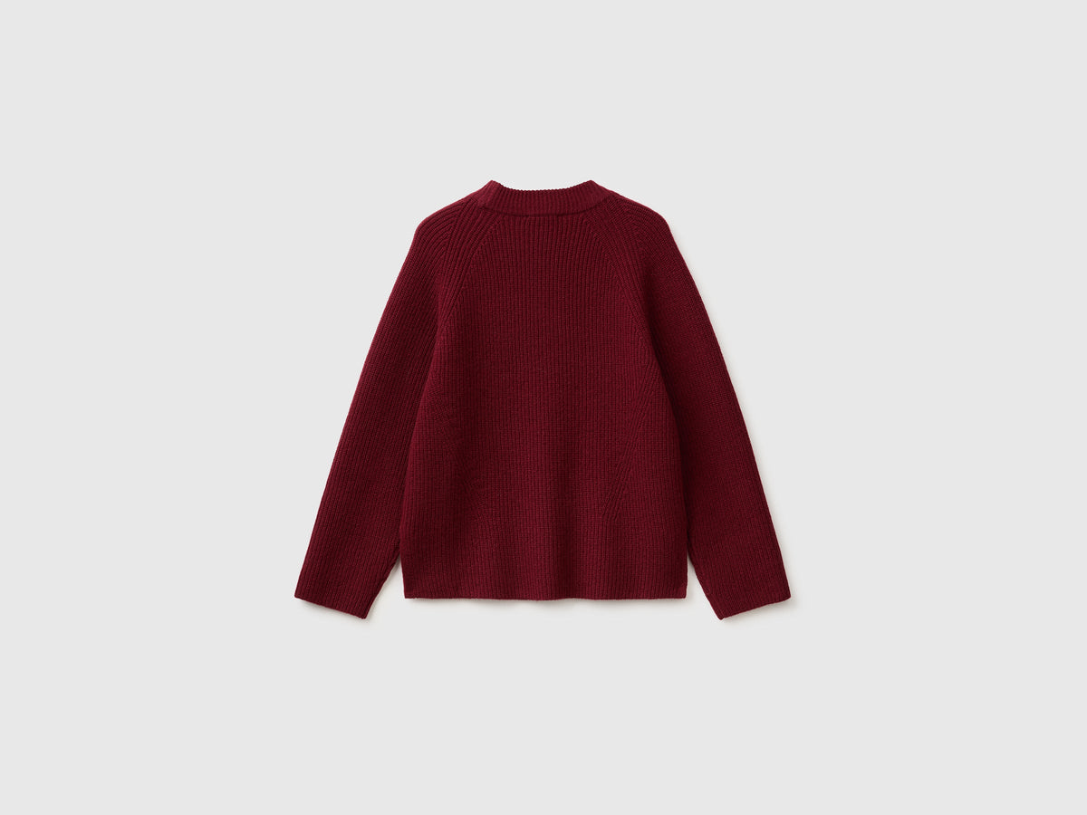 Maglia 100% lana con spacchetti sui fianchi