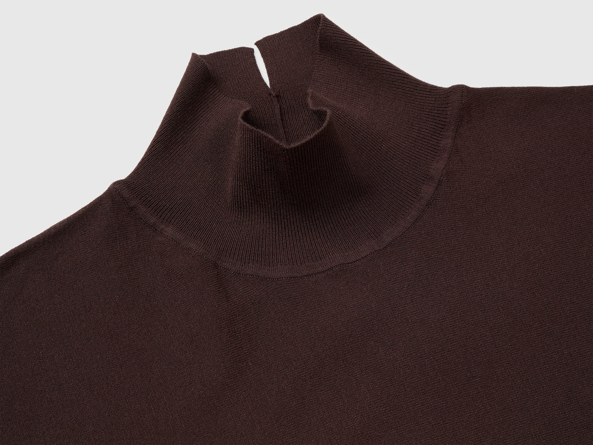 Maglia collo alto con manica a pipistrello