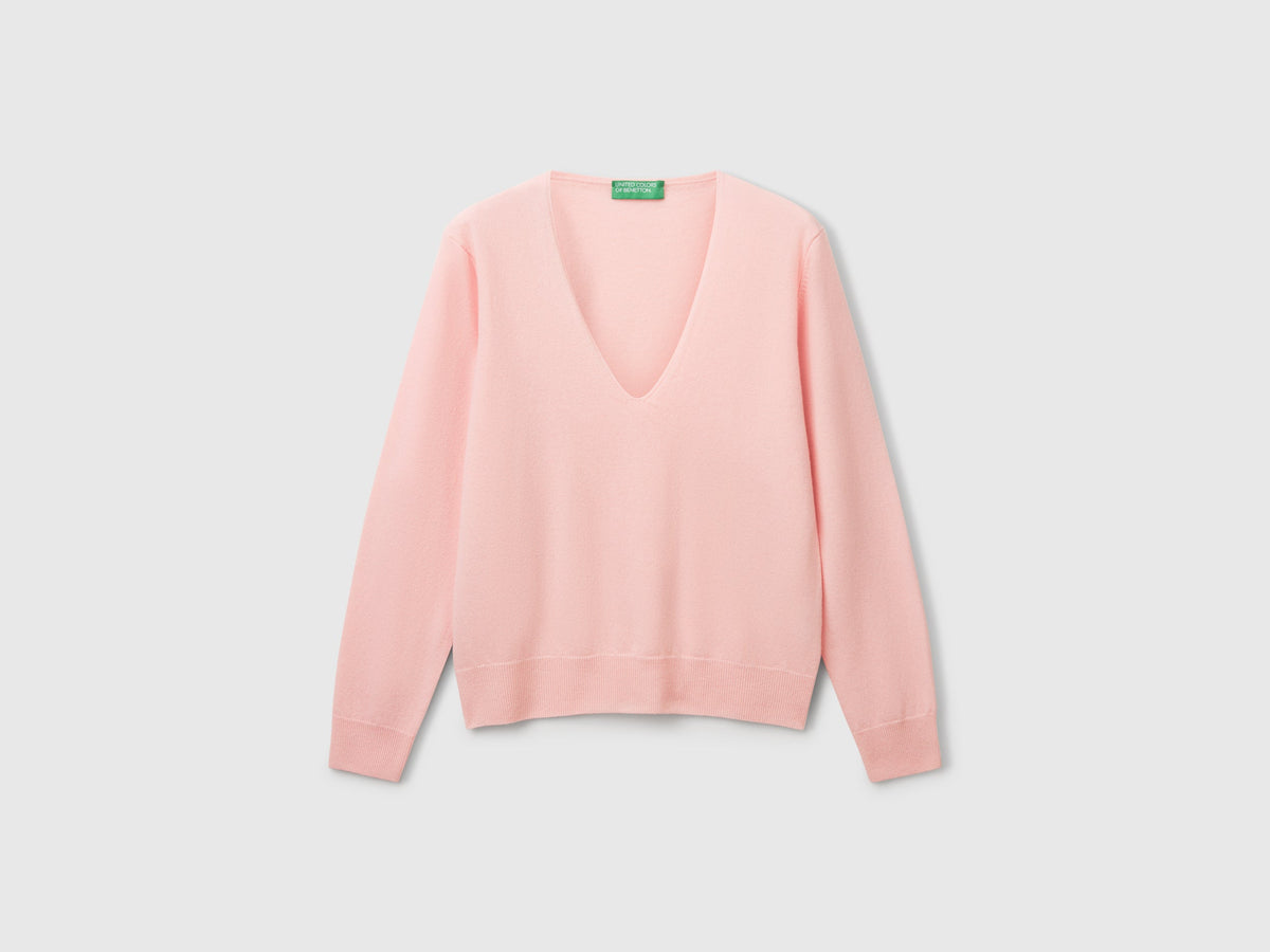 Maglione rosa cipria con scollo a V in pura lana Merino
