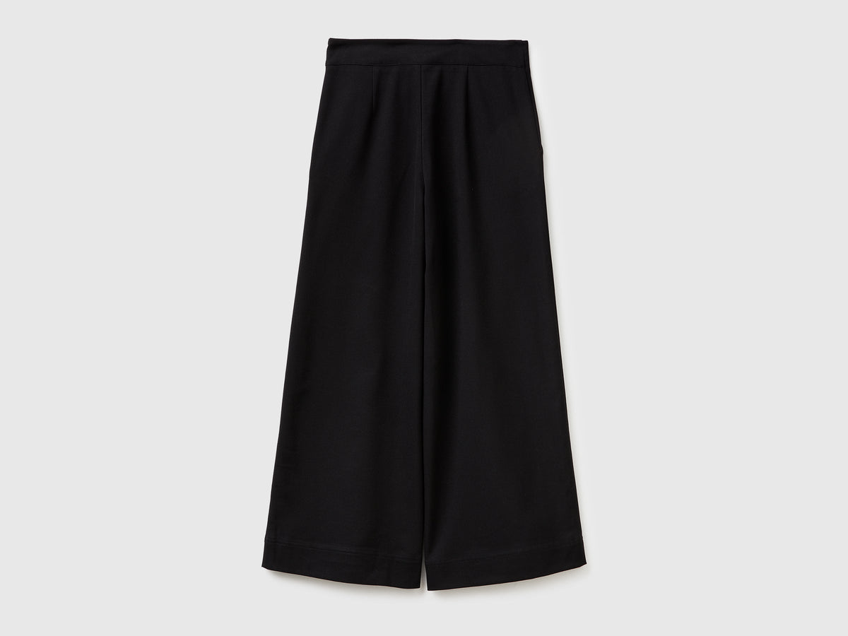 Pantaloni a vita alta con bottoni