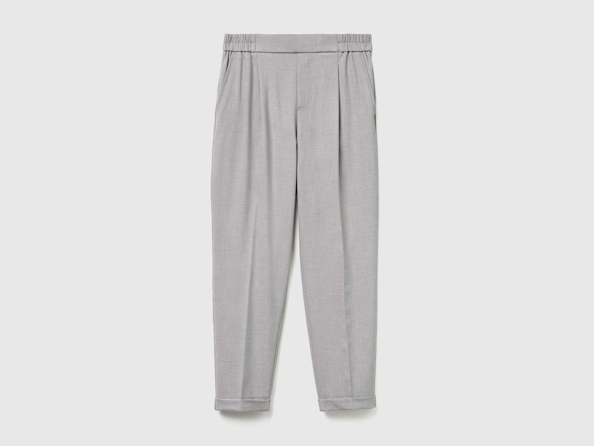 Pantaloni con risvolto in misto viscosa stretch